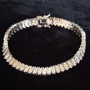 Woman's Silver-tone Tennis Bracelet